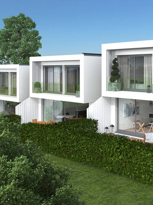 Construction d’un ensemble de 3 villas jumelées par les couverts à Corsier.